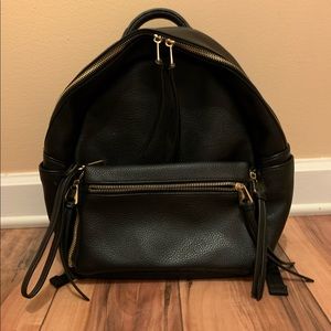 Charming Charlie Faux Leather Back Pack